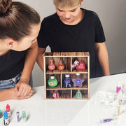 Child making potions with the Buki Potions Lab