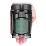Kowa Genesis 10x22 compact binoculars in hand