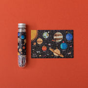 Londji Planets micropuzzle with its test tube packaging