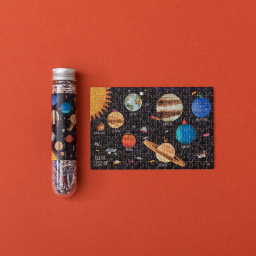 Londji Planets micropuzzle with its test tube packaging