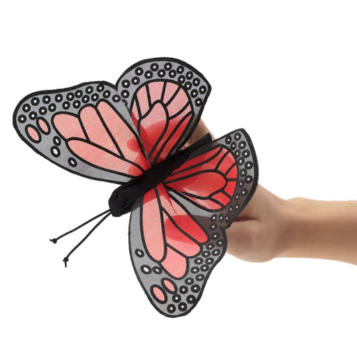 Marionnette à doigt Papillon monarque Folkmanis, ailes déployées sur la main
