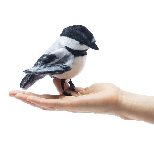 Folkmanis Mini Chickadee finger puppet worn on a hand