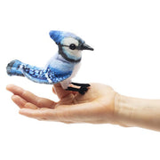 Folkmanis Mini Blue Jay finger puppet worn on a hand